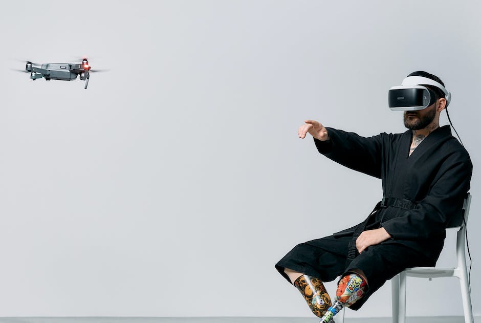 Image of a person surrounded by various electronic devices at a Costco store